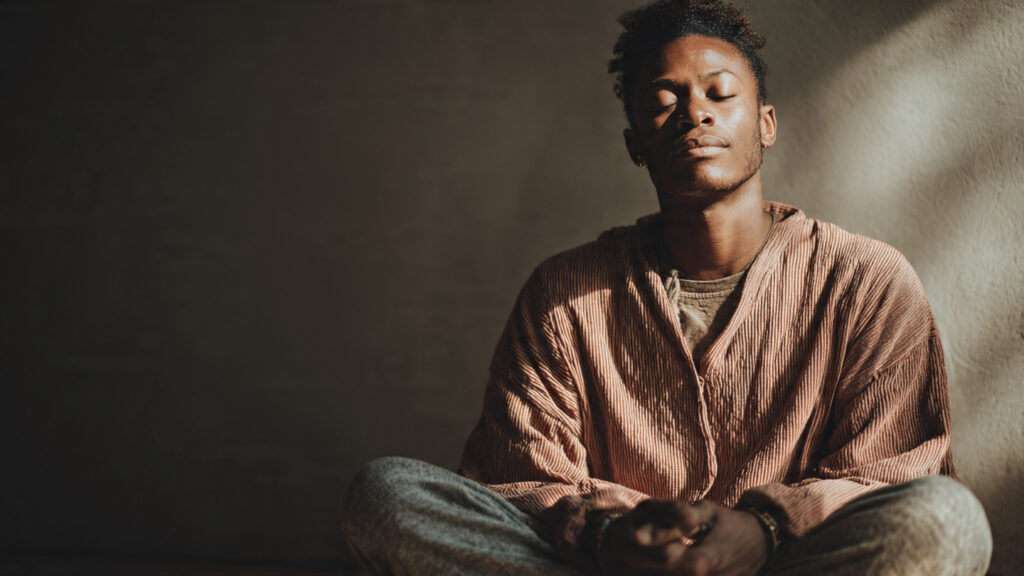 a lifestyle photograph of a person sitting