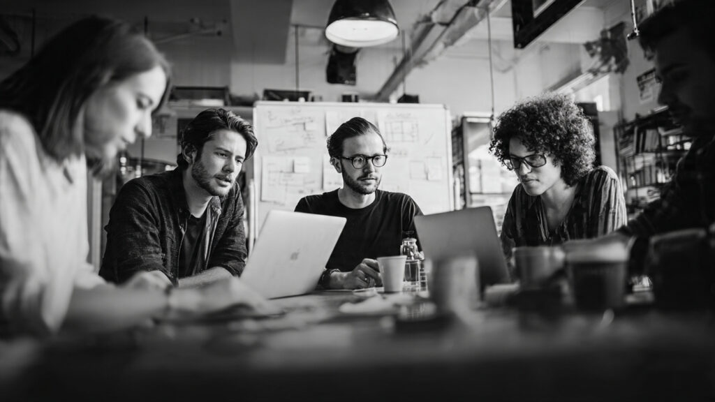 a startup team reviewing a simple prototype