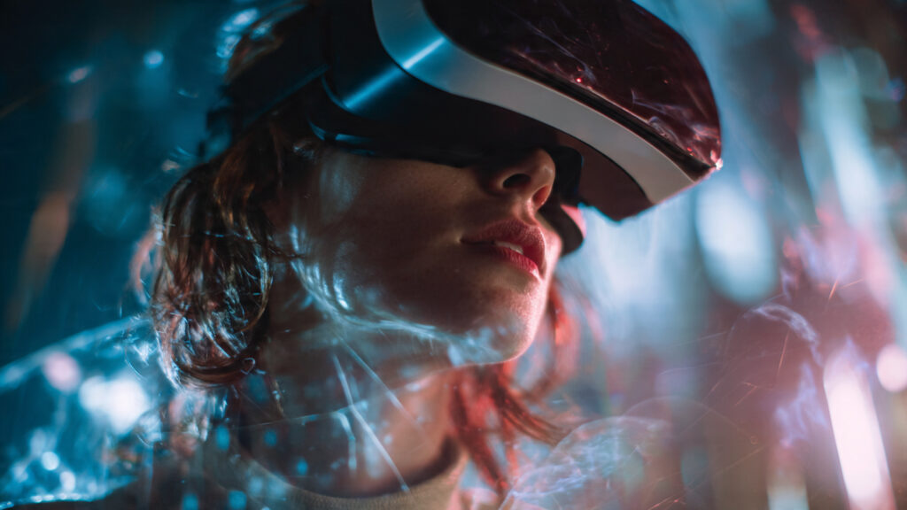 person wearing vr headset interacting with holographic